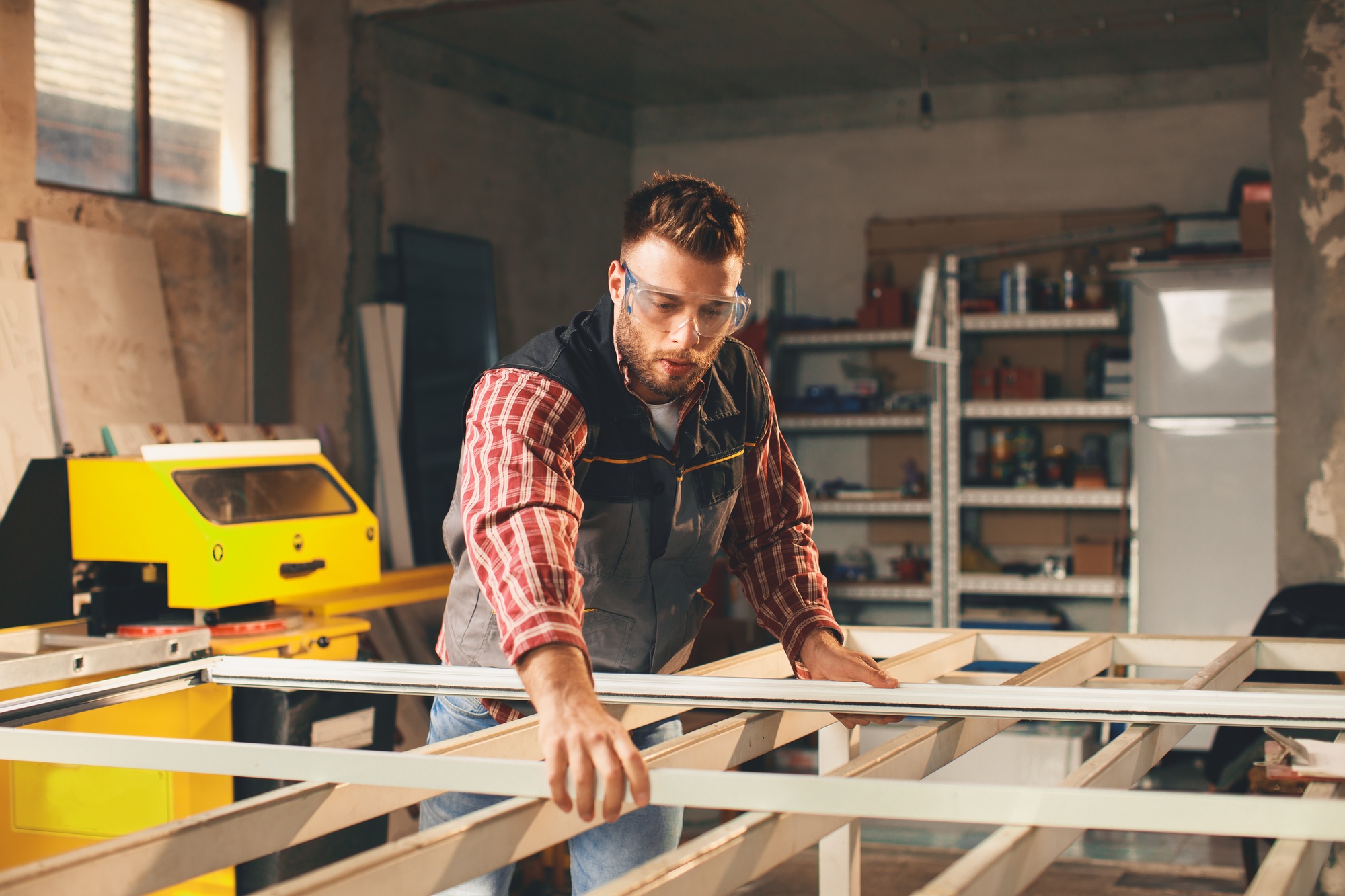 Young men in pvc carpentry workshop